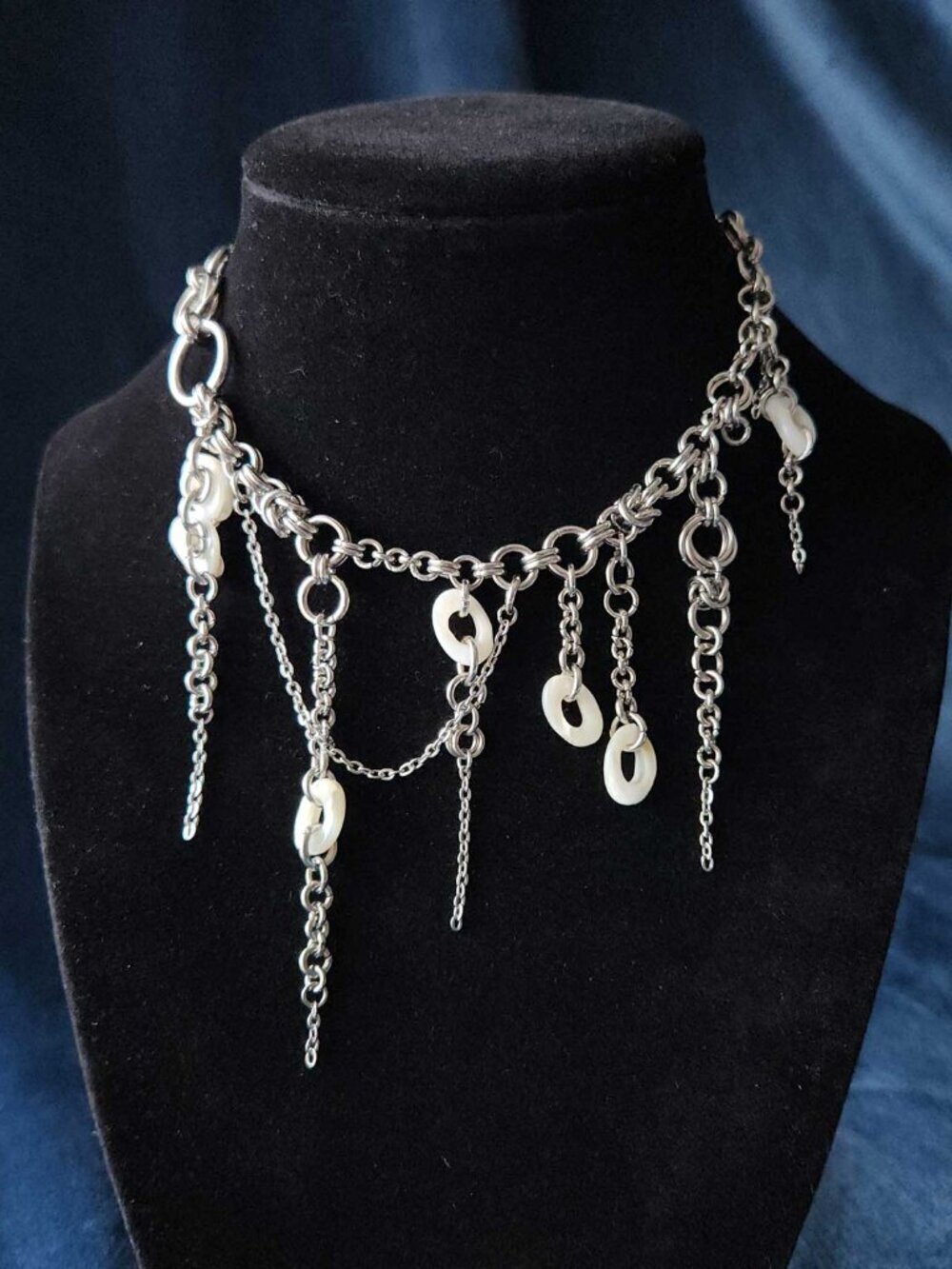 Mermaid's asymmetrical white pearl and silver chunky statement necklace